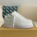 Embossed Monogram White Sneakers
